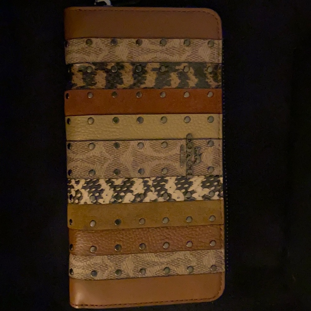 Brand new Coach snakeskin print wallet.